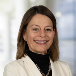 Portrait of Sandy Schrieber, a Principal consultant supporting leadership, safety, culture, and high‑performance enhancements across the Middle East